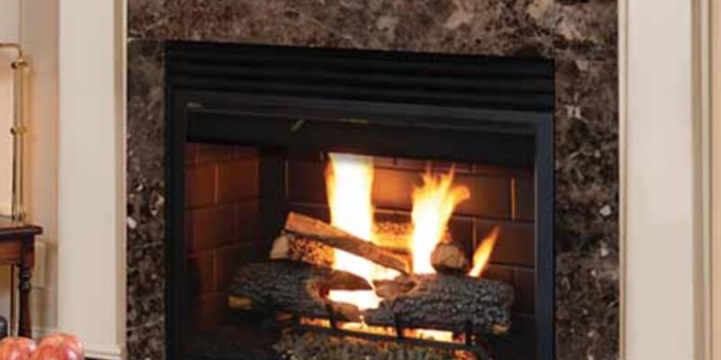 Cozy fireplace with white mantel and stone surround - KreteworX Idaho Falls fireplace.