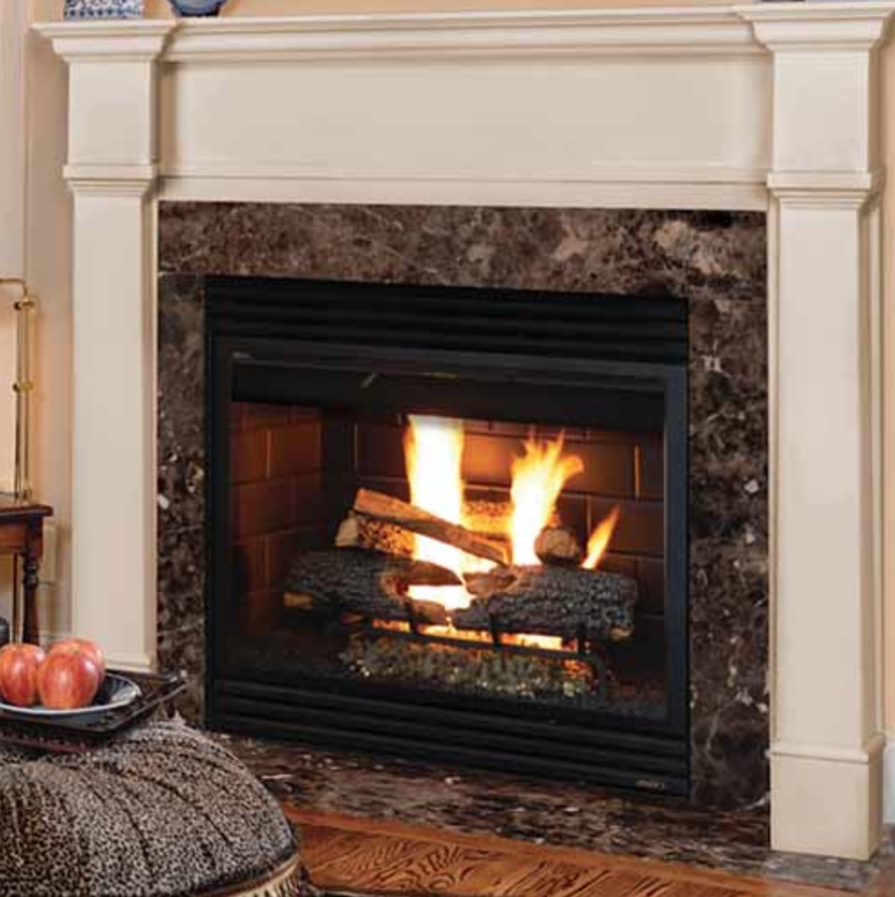 Cozy fireplace with white mantel and stone surround - KreteworX Idaho Falls fireplace.