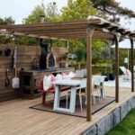 Pergola covered dining area with outdoor stove - KreteworX Idaho Falls outdoor kitchen.