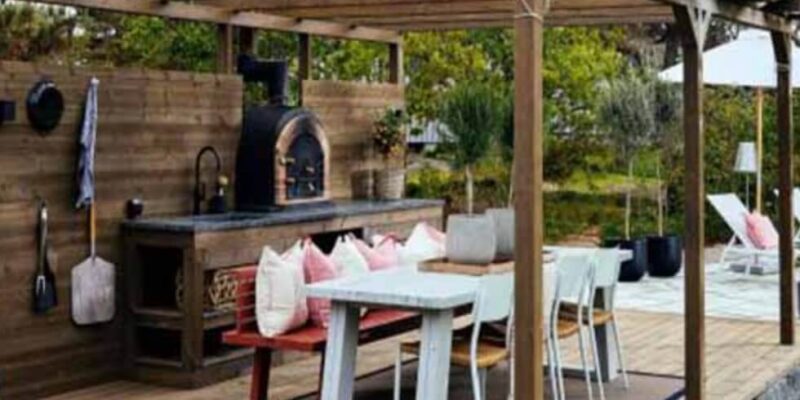 Pergola covered dining area with outdoor stove - KreteworX Idaho Falls outdoor kitchen.