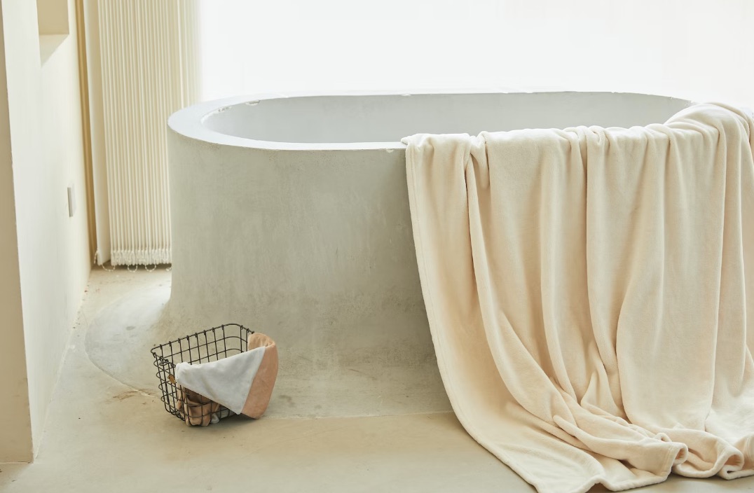 A finished custom concrete bathtub by KreteworX in Idaho Falls.