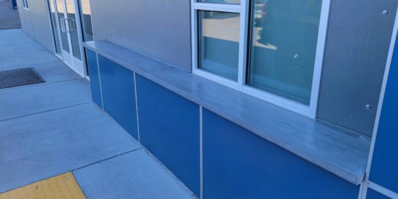 Commercial shelf of concrete on blue exterior by KreteworX of Idaho in Idaho Falls.